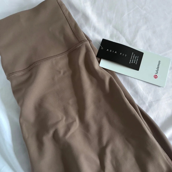🆕🤎 Lululemon Asia Fit Wunder Train HR Tight 24” Hem Slit - Tauptastic Tan - Picture 2 of 14